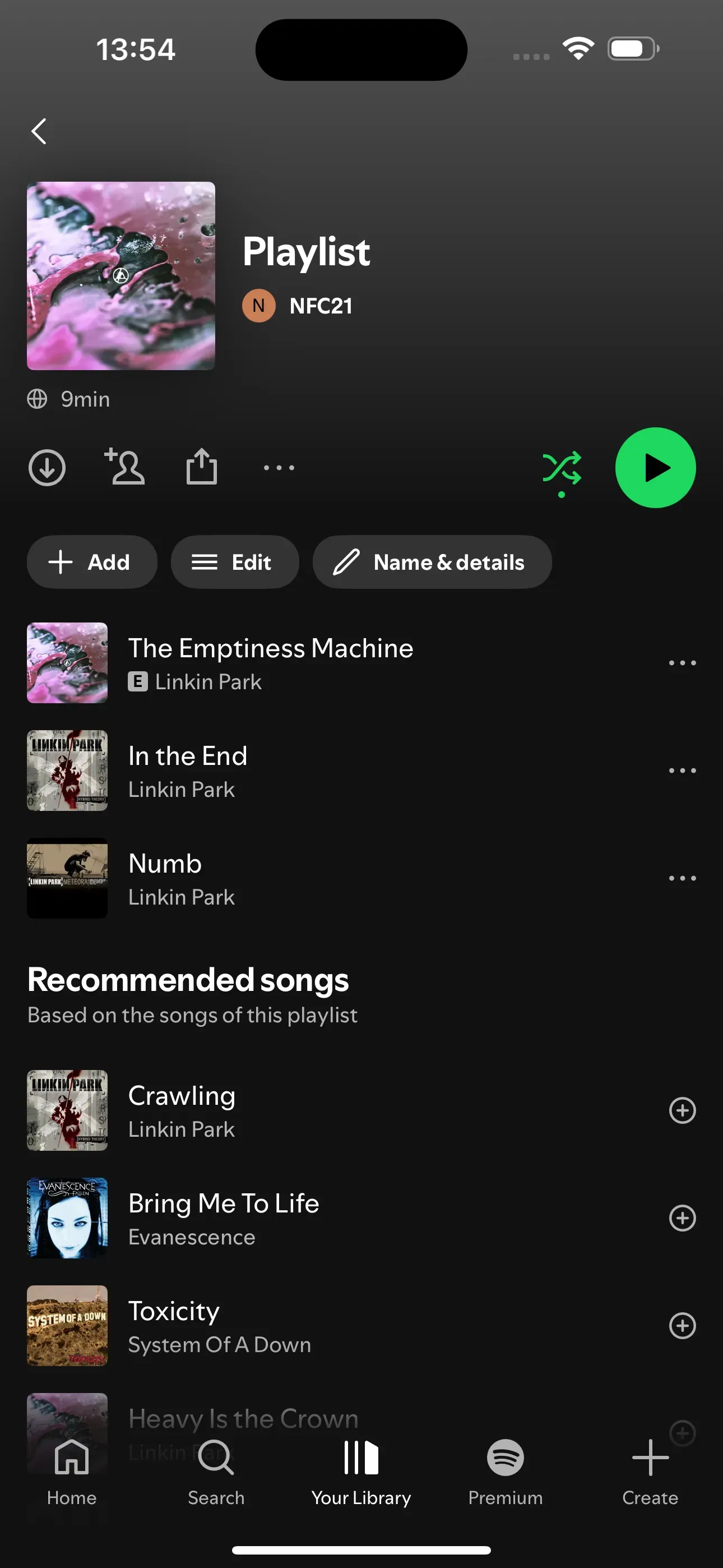 The ‘NFC21’ playlist is visible, and the three small grey dots in the top centre are framed in red.